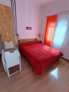 A bed or beds in a room at Lilliput Studio Corfu Old Town