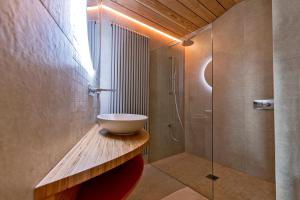 a bathroom with a bowl sink and a shower at le petit ballon in Ventron +14 photos