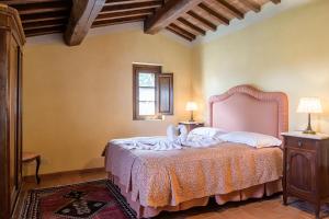 Postel nebo postele na pokoji v ubytování I Grandi Di Toscana