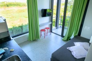 TV a/nebo společenská místnost v ubytování Bikini Apartments
