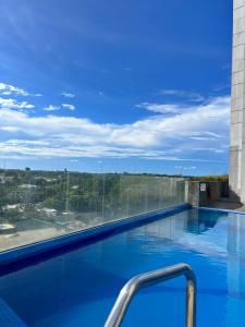 a swimming pool with a view of the sky at Casa Luna Unit 1 in Manila +5 photos