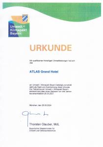una schermata del sito dell'università di Akansas Grand Hotel di Atlas Grand Hotel a Garmisch-Partenkirchen