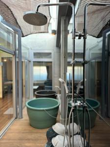 Bagno di EarthVeloビル一棟貸しでフルリノベ済み各階に風呂トイレありで好立地でコスパ最高をめざしている宿です