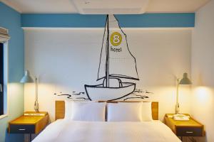 Postel nebo postele na pokoji v ubytování 8 Hotel Shonan Fujisawa