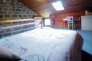 Postel nebo postele na pokoji v ubytování Le Petit Aigu
