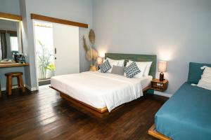 Katil atau katil-katil dalam bilik di Manta Dive Gili Trawangan Resort