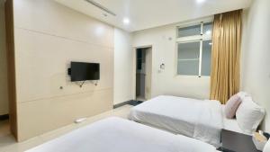Voodi või voodid majutusasutuse Love vacation B&B toas