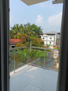 a view from the balcony of a building at GRACE REGENCY in Ernakulam