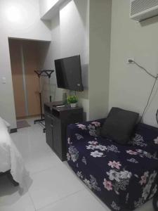 TV a/nebo společenská místnost v ubytování 101 Newport Boulevard East Wing Pasay City
