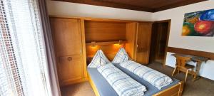 Postel nebo postele na pokoji v ubytování Appartements Moser