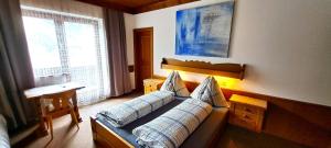 Postel nebo postele na pokoji v ubytování Appartements Moser