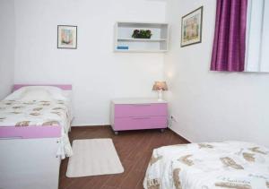 Posteľ alebo postele v izbe v ubytovaní Apartment Lina Deluxe