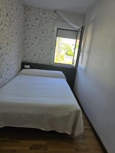 Cama o camas de una habitación en Noja Rooms