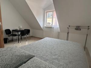 Posteľ alebo postele v izbe v ubytovaní Apartamenty Gołębia-Economic