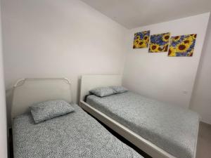 Posteľ alebo postele v izbe v ubytovaní Apartamenty Gołębia-Economic