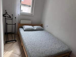 Posteľ alebo postele v izbe v ubytovaní Apartamenty Gołębia-Economic