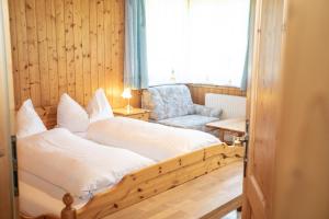 Postel nebo postele na pokoji v ubytování Schaffergut Appartements
