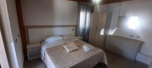 Ένα ή περισσότερα κρεβάτια σε δωμάτιο στο Mission Relax 4