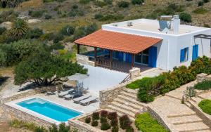 an aerial view of a villa with a swimming pool at Boutique Villa Olivia in Agios Pavlos