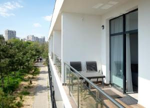 Апартаменты в Аркадии - Arcadia Sky Apartments的阳台或露台