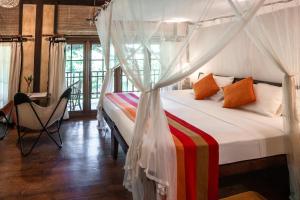 Katil atau katil-katil dalam bilik di Dunes Unawatuna Hotel