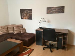 Зона вітальні в Gösser BACHGASSLHOF -- Bed and Breakfast -- Apartments