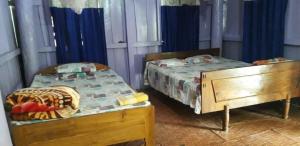 Postel nebo postele na pokoji v ubytování Mountain View Homestay Raimatang