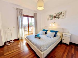 Łóżko lub łóżka w pokoju w obiekcie Casa Daniela en Costa Teguise