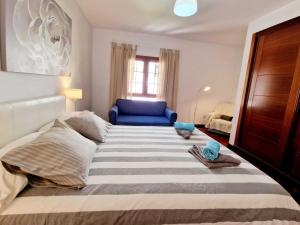 Łóżko lub łóżka w pokoju w obiekcie Casa Daniela en Costa Teguise