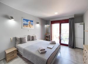 Ein Bett oder Betten in einem Zimmer der Unterkunft Excess Pansion