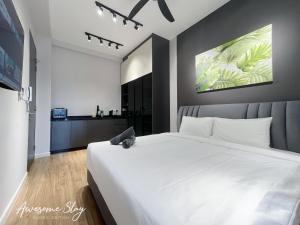 Cama o camas de una habitación en Sunway Velocity Two By Awesomestay