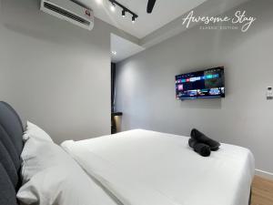 Cama o camas de una habitación en Sunway Velocity Two By Awesomestay