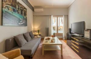 Μια τηλεόραση ή/και κέντρο ψυχαγωγίας στο Holodek Apartments Ground & SemiBasement