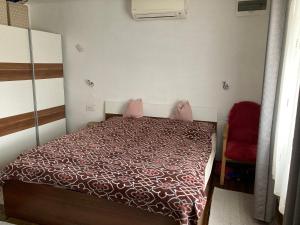 Postel nebo postele na pokoji v ubytování Balatonszéplaki nyaraló