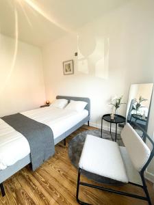 Кровать или кровати в номере Berchem - Guest House