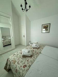 Ένα ή περισσότερα κρεβάτια σε δωμάτιο στο Vivienda Vacacional Casa Mateo