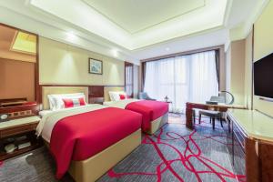 Katil atau katil-katil dalam bilik di Xi'an Lanxi International Hotel