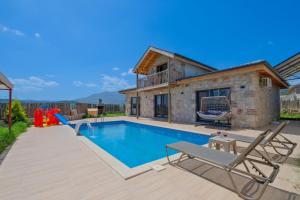 Villa con piscina y casa en Villa İkizler 2, en Fethiye