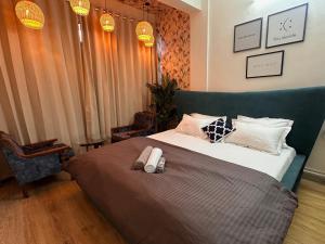 Ένα ή περισσότερα κρεβάτια σε δωμάτιο στο Rio : Cozy 1Bhk in Koregaon Park. WiFi AC King Bed