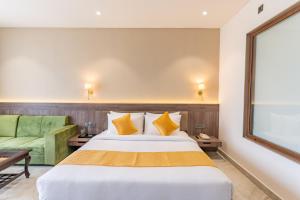 Shervani Pebbles & Pines Resort & Spa, Corbett客房内的一张或多张床位