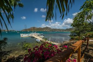 a view of a marina with boats in the water at The Lodge - Antigua in English Harbour Town