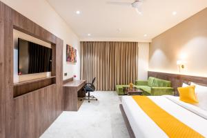 Shervani Pebbles & Pines Resort & Spa, Corbett客房内的一张或多张床位