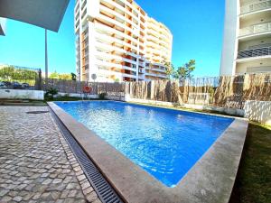 Бассейн в Edificio Lumina Sunshine Beach Apartment или поблизости