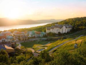 an aerial view of a resort with a lake at Fairmont Tremblant in Mont-Tremblant