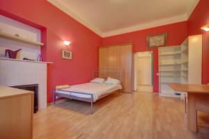 
Кровать или кровати в номере Longo Apartment Griboedova 9
