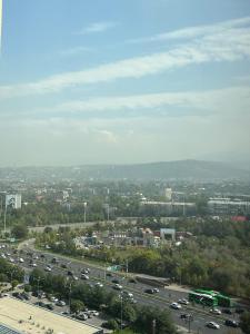 a view of a city with traffic on a highway at Yourhome - #105 Комфорт сити in Almaty