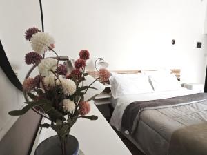 Postel nebo postele na pokoji v ubytování La Casa dei Carrai