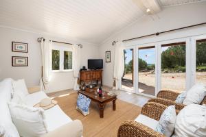 Телевизор и/или развлекательный центр в Villa Irene