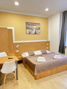 Posteľ alebo postele v izbe v ubytovaní Rabie Aparthotel