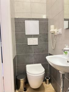 Kúpeľňa v ubytovaní Rabie Aparthotel